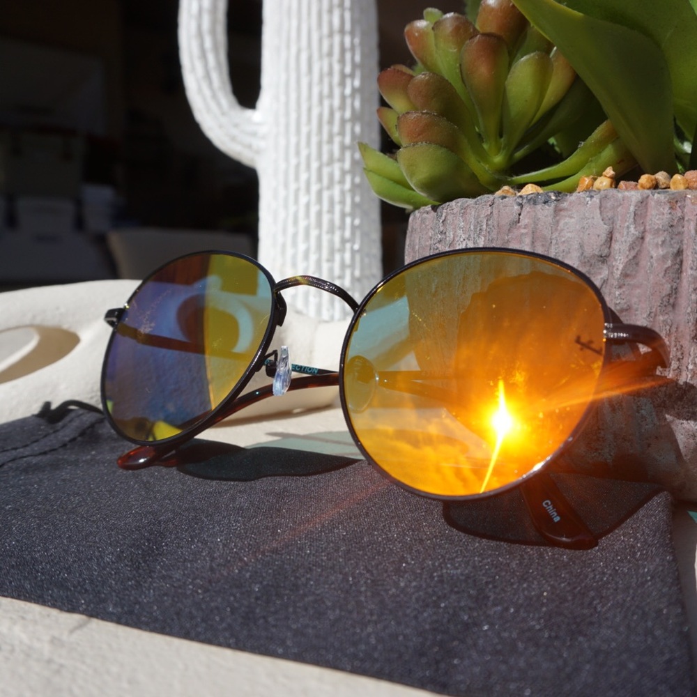 Black sunglasses with Orange mirrored lenses